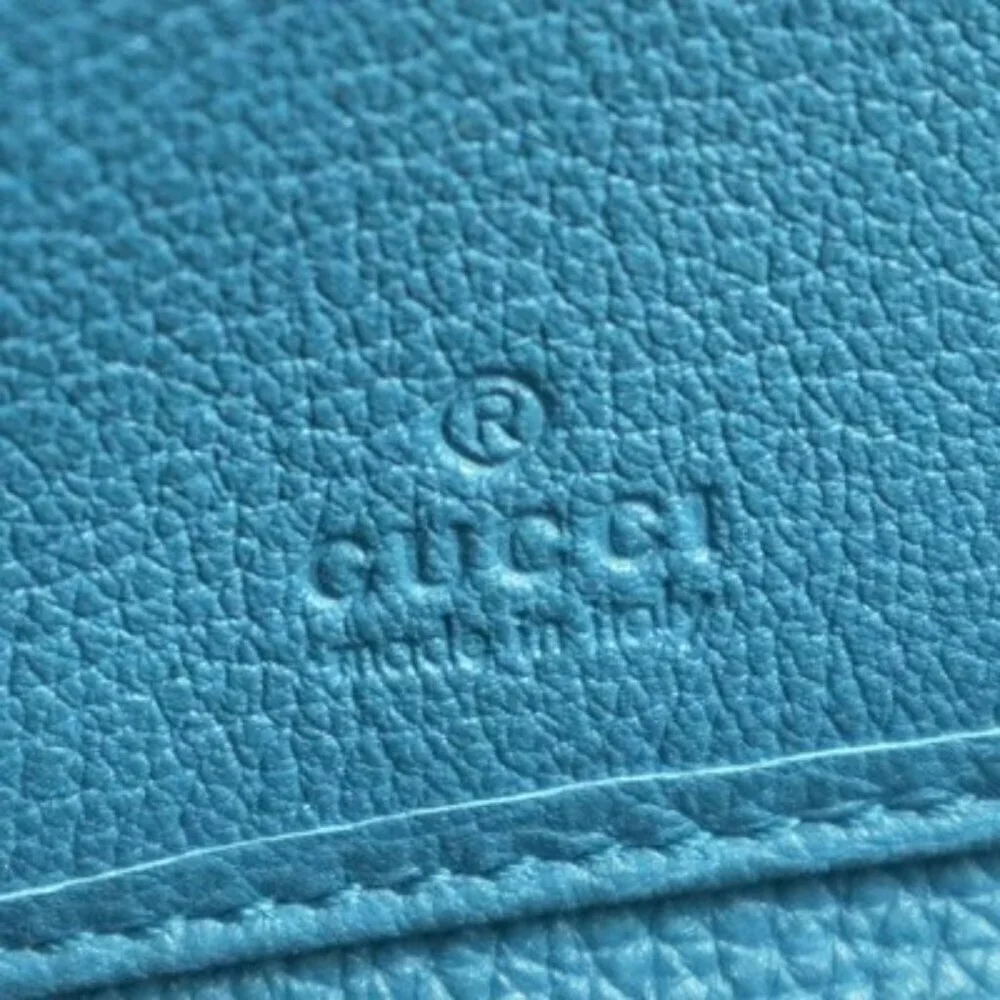 Gucci Blue Leather Zip-Around Wallet  Embossed Logo Authentic